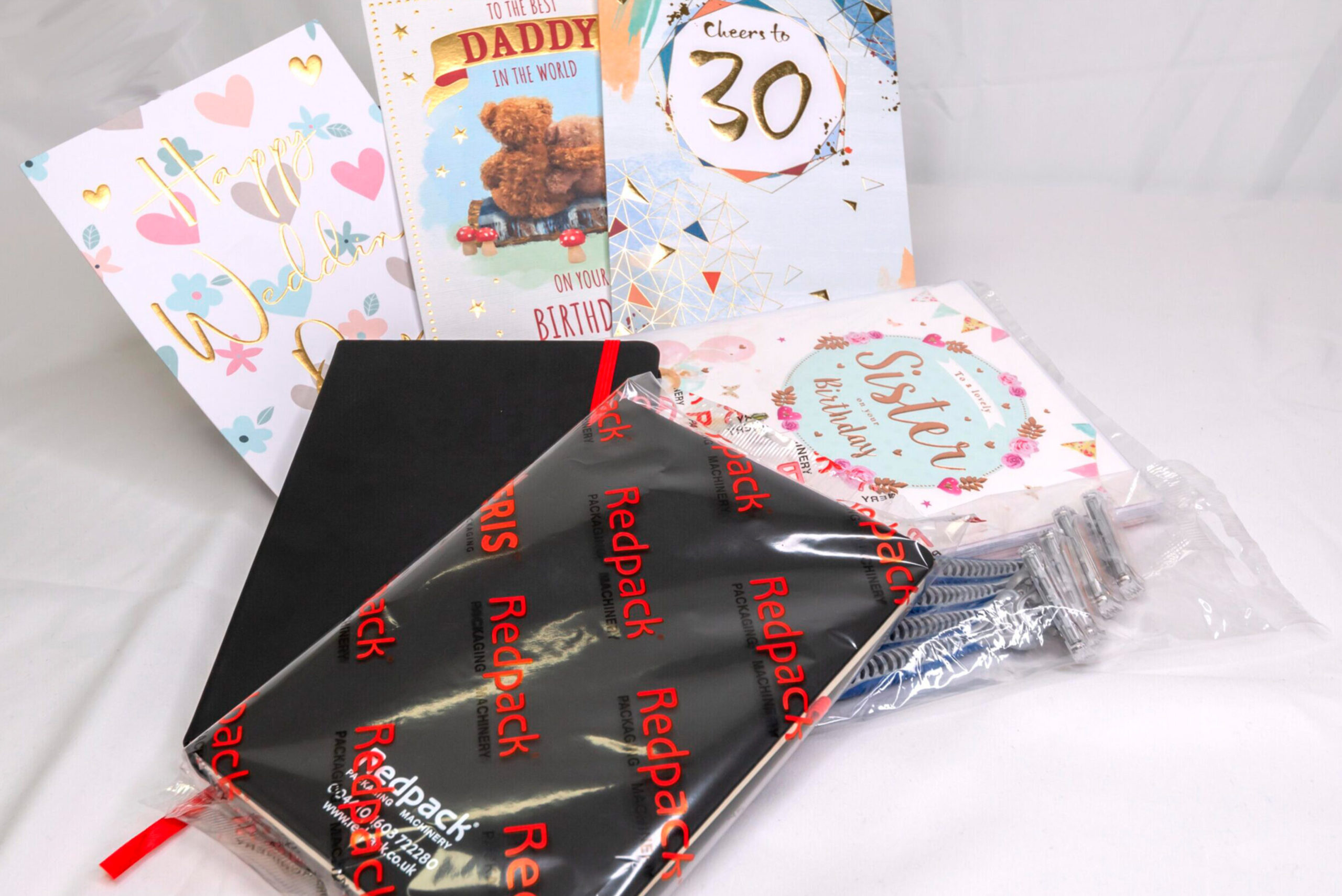 non food products flow wrapped packaged Redpack Packaging machinery